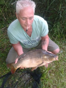 Lothar Komorek 30.07.2014 Spiegelkarpfen 69cm , 7100g